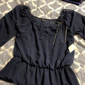 Navy blue blouse with scalloped detail and bow